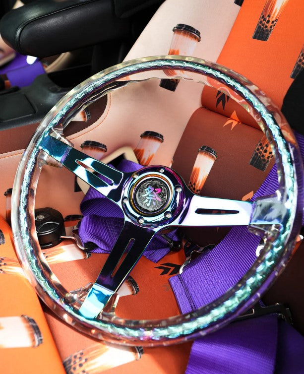 NRG Drift Matsuri steering wheel clear color on a seat