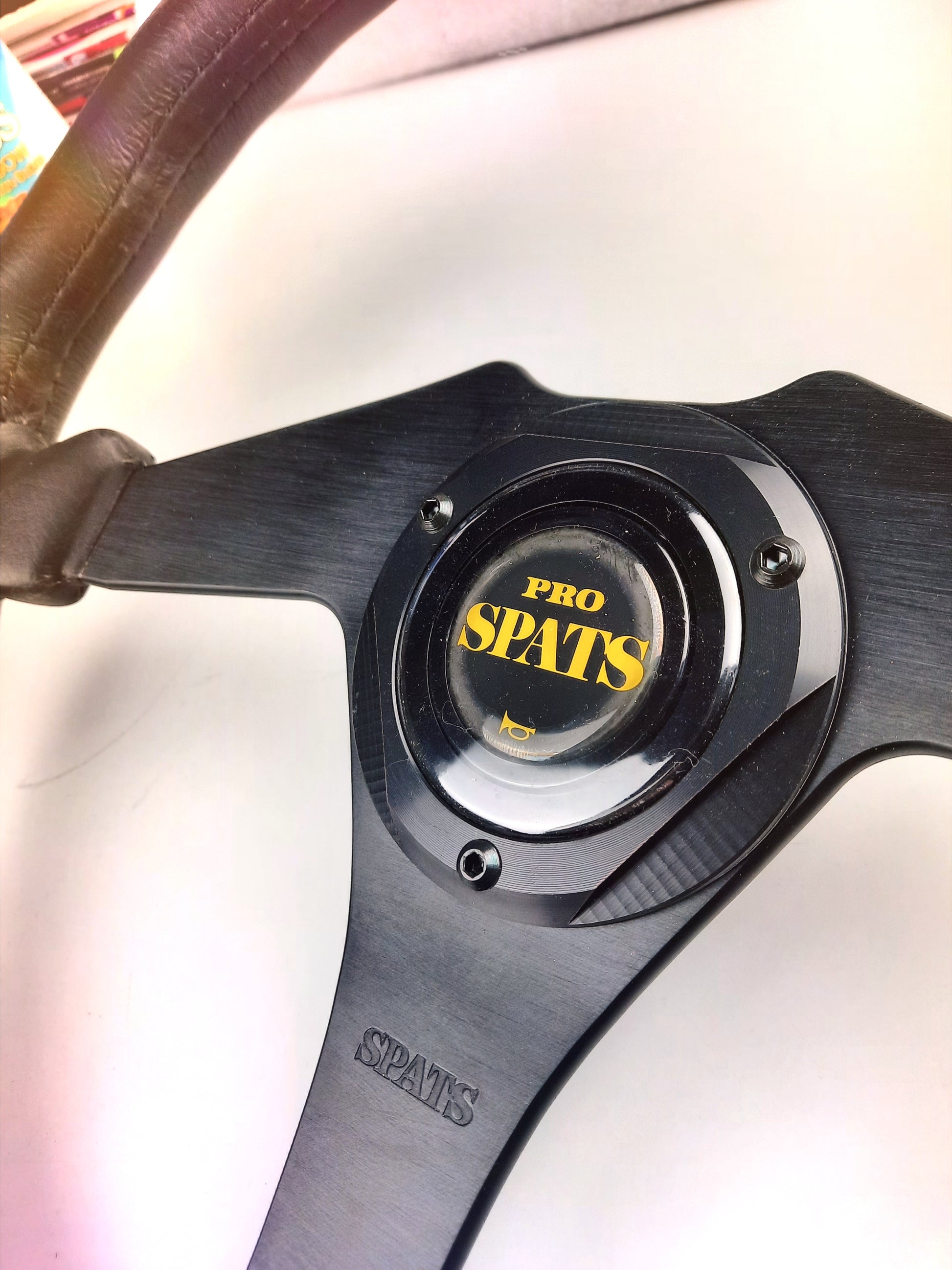 PRO SPATS Steering wheel, horn button detail photo  - JDM Import