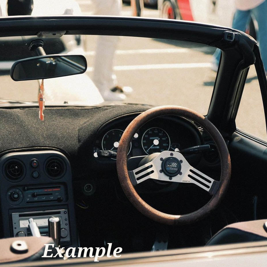 ABARTH two spoke steering wheel - photo example mounted on a Mazda MX5 Miata- JDM Import