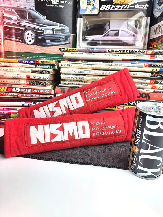 NISMO old logo seat belt cushion pads, made by MARUTA DESIGN Japan under copyright in the 90's.